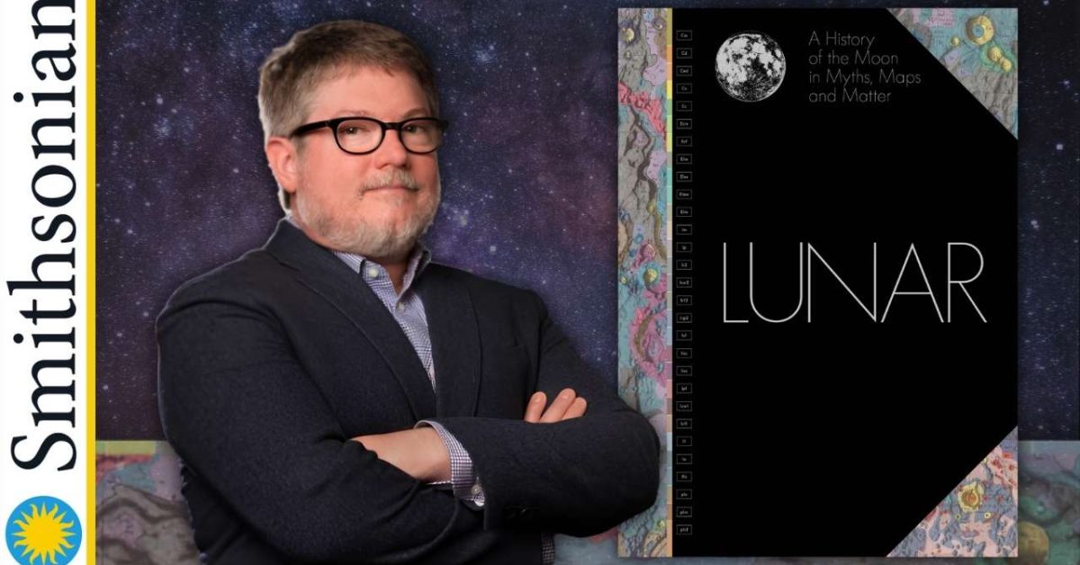 Man with glasses poses beside a lunar-themed book cover